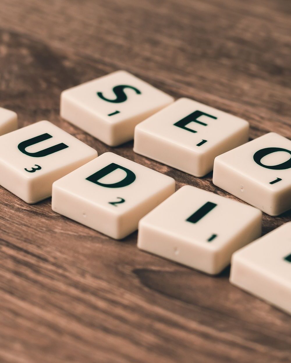 seo audit white blocks on brown wooden surface